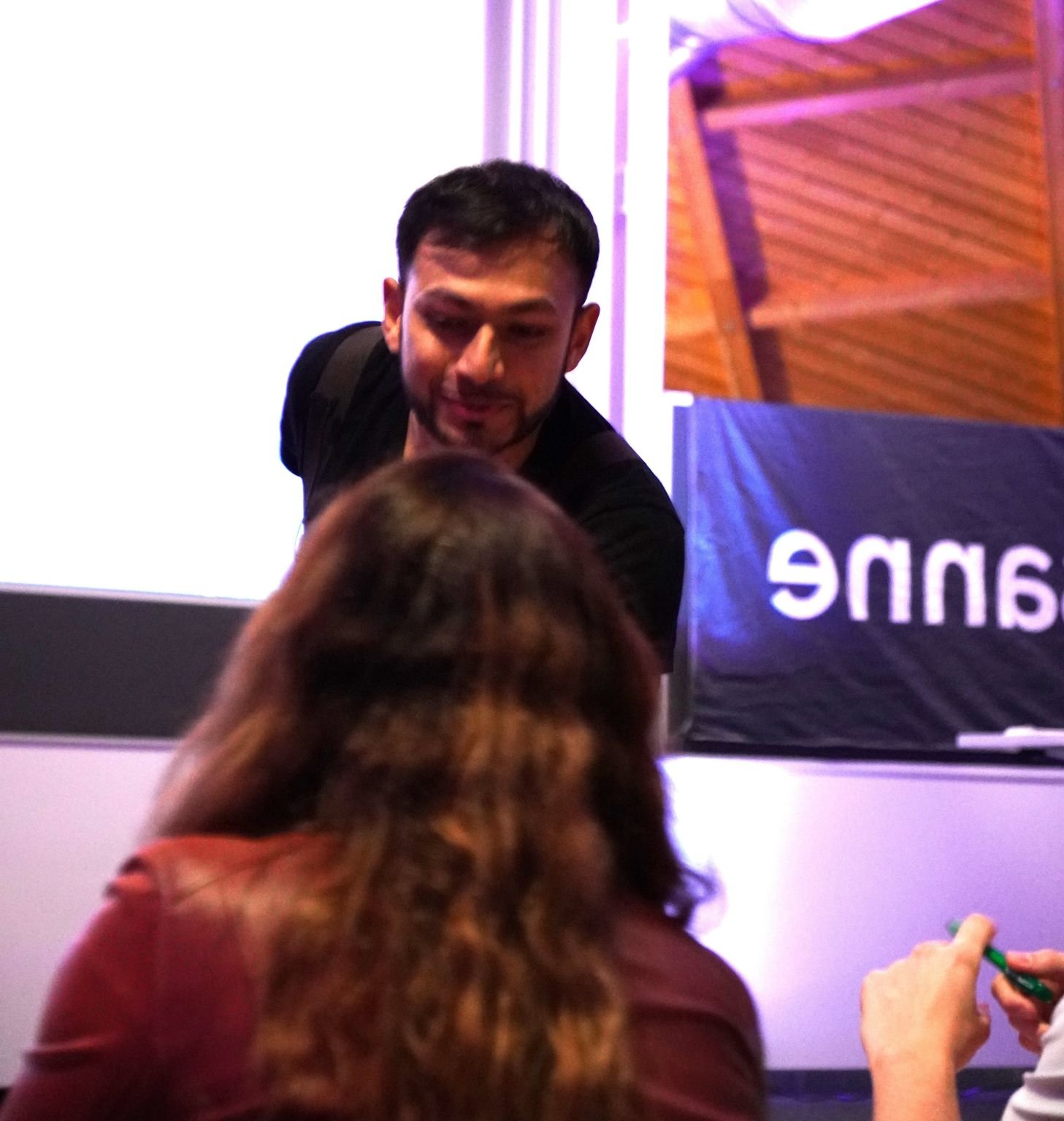 A business handshake at an event